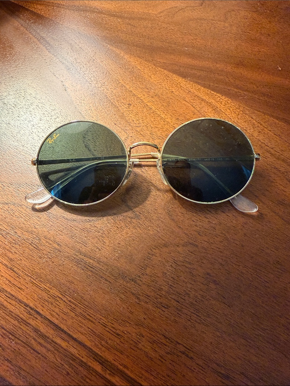 Ray-Ban Gold Frame Oval Sunglasses with Dark Green Lenses